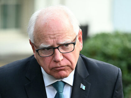 Governor of Minnesota Tim Walz speaks to reporters after meeting with US President Joe Bid