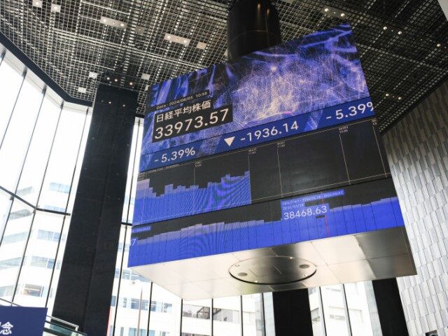 An electronic stock board displayed inside the Kabuto One building in Tokyo, Japan, on Mon