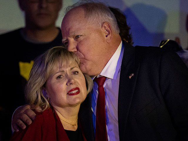 Minnesota DFL (Democratic-Farmer-Labor Party) Governor Tim Walz, kissed his wife Gwen Walz