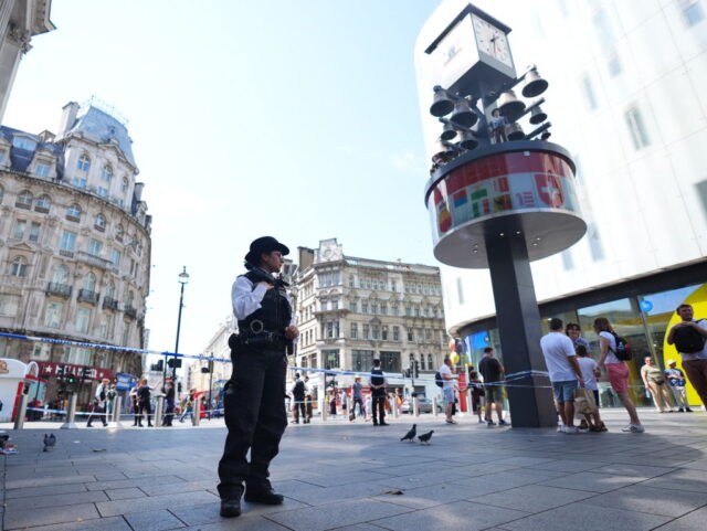 Police officers at the scene in Leicester Square, London, as a man has been arrested after