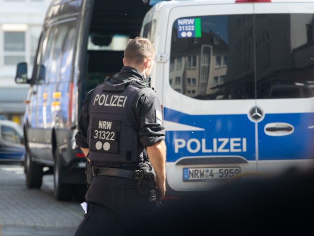 Police seal off the stabbing site after a stabbing attack at a local festival, which kills