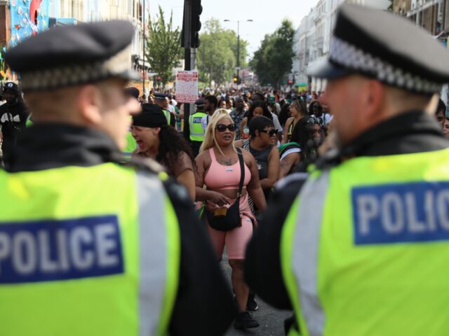 LONDON, ENGLAND - AUGUST 26: Revellers attend Notting Hill Carnival on August 26, 2024 in