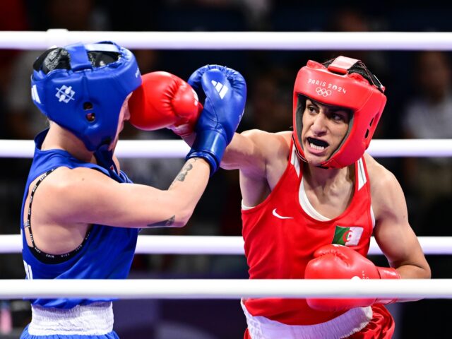 VILLEPINTE, FRANCE - AUGUST 3: Imane Khelif (red) of Team Algeria competes against Anna Lu