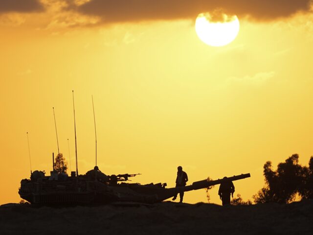 Israeli tank at sunset (Ohad Zwigenberg / Associated Press)