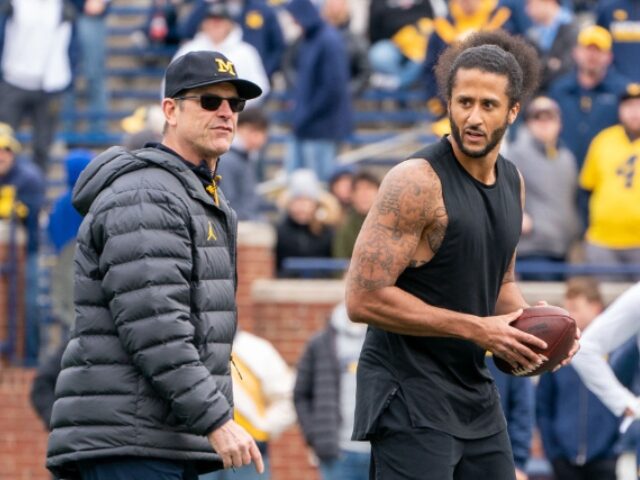 ANN ARBOR, MI - APRIL 02: Colin Kaepernick interacts with Michigan Wolverine head coach Ji