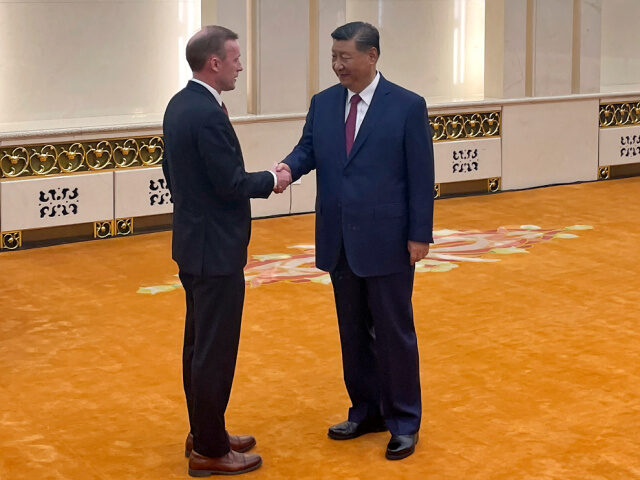 White House national security adviser Jake Sullivan, left, and Chinese President Xi Jinpin