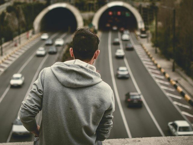 Man on highway overpass