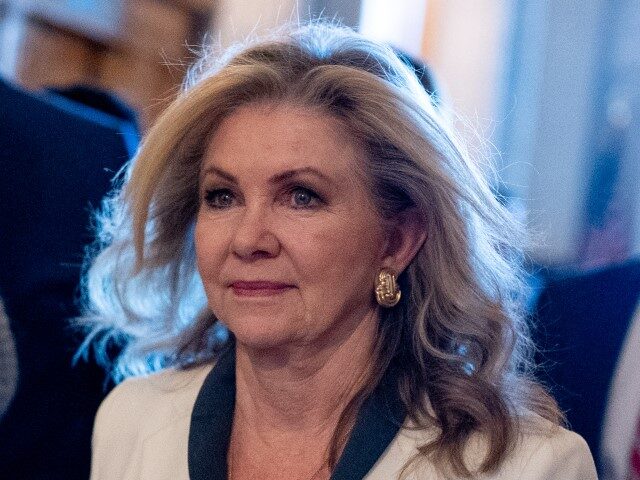 Sen. Marsha Blackburn (R-TN) walks into the Senate Chamber on Capitol Hill on April 23, 20