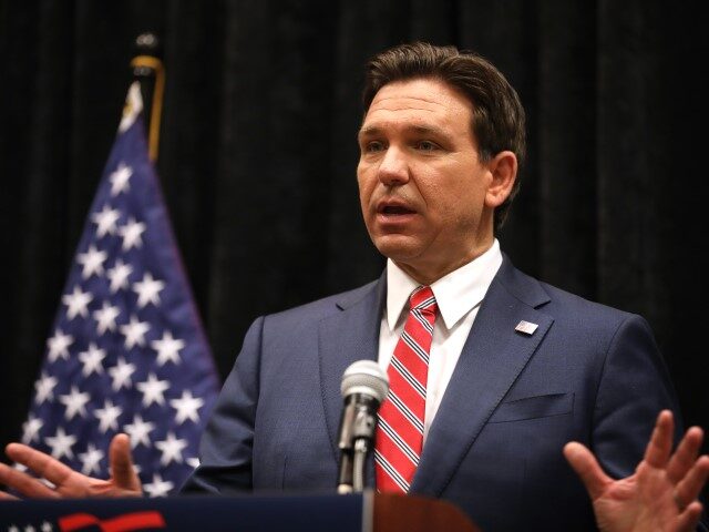 Governor Ron DeSantis speaking with the media at a press conference after a town hall host