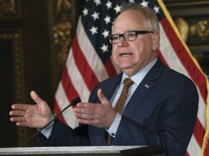 Minnesota Gov. Tim Walz addresses a news conference Tuesday, Feb. 5, 2019 in St. Paul, Min