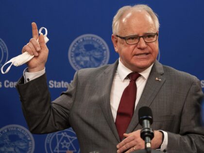 FILE - In an April 30, 2020 file photo, Minnesota Gov. Tim Walz answers questions while ho