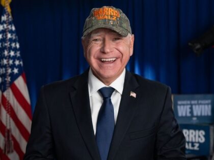 Tim Walz with camo hat