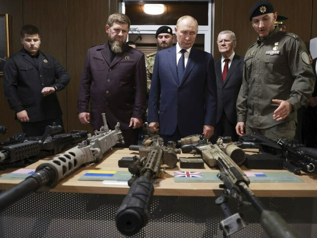 Russian President Vladimir Putin, accompanied by head of the Chechen Republic Ramzan Kadyr