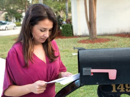 Woman at her mailbox