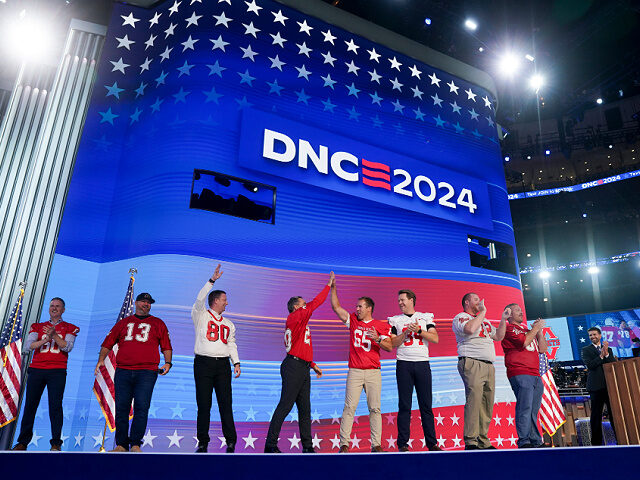 Former members of the Mankato West High School football team during the Democratic Nationa