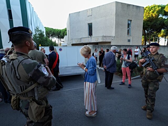 French soldiers of the Sentinelle Security Operation patrol after a ceremony in support of