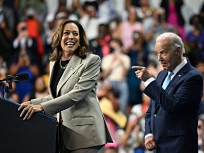 US President Joe Biden watches as Vice President and Democratic presidential candidate Kam