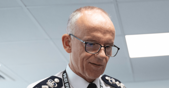 Losing Control: Police Chief Snatches Microphone From Journalist's Hand