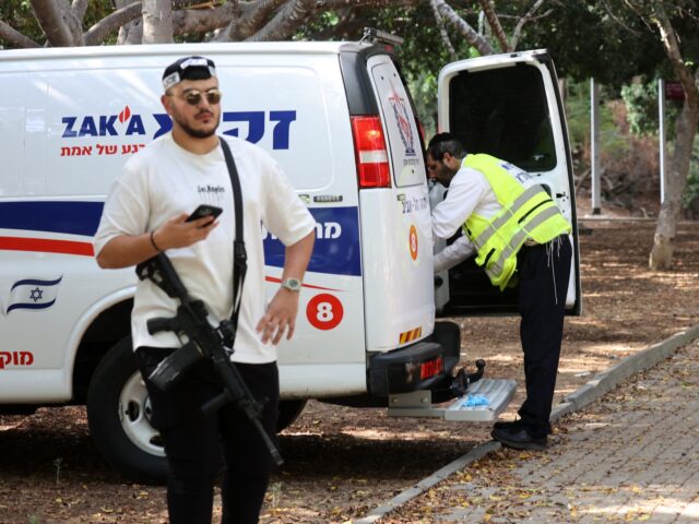 EDITORS NOTE: Graphic content / Israeli first responders investigate the scene of a report