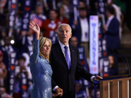 CHICAGO, ILLINOIS - AUGUST 19: President Joe Biden and First Lady Jill Biden acknowledge a