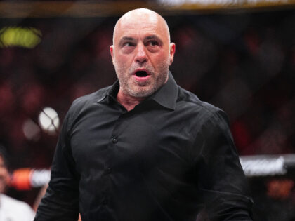 LAS VEGAS, NEVADA - APRIL 13: Joe Rogan reacts to the knockout win by Max Holloway in the