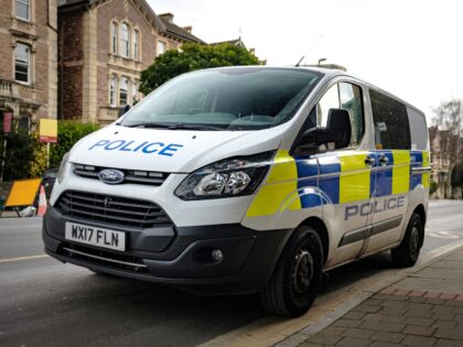 UK Police Van, white stickered Ford Transit van from the Avon and Somerset Police force sh