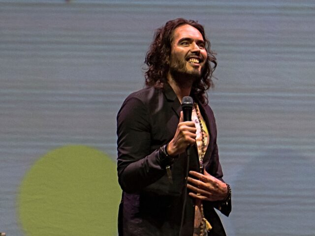 Russell Brand performs during his Trew World Order tour at Qantas Credit Union Arena on Oc