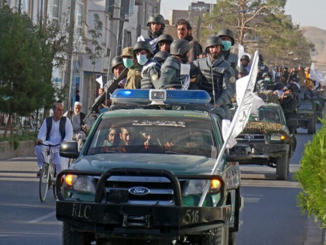 In this photograph taken on September 13, 2022, newly recruited Taliban fighters parade in