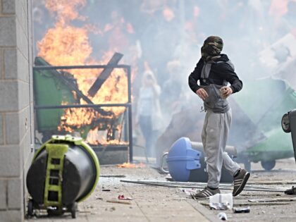 Travels Alerts ROTHERHAM, ENGLAND - AUGUST 4: Anti-migration protesters are seen during ri