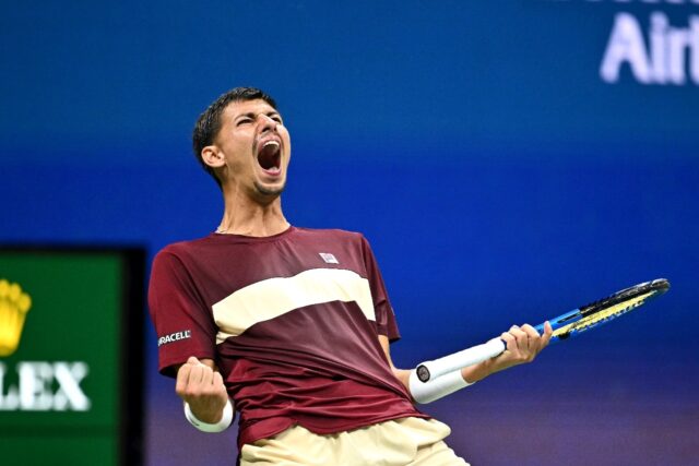 Australian Alexei Popyrin celebrates a service break in his upset win over defending champ