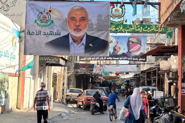 A banner bearing the picture of slain Hamas leader Ismail Haniyeh in the Palestinian refug