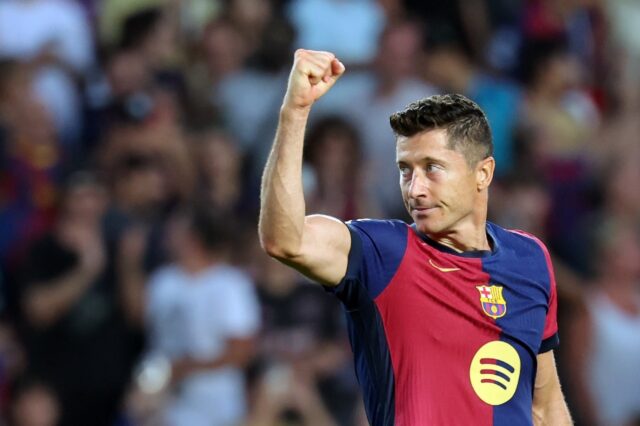 Barcelona's Polish forward Robert Lewandowski celebrates scoring his team's second goal ag