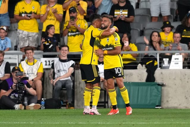 Columbus Crew striker Diego Rossi (R) scored twice in the reigning MLS champions' 3-2 home