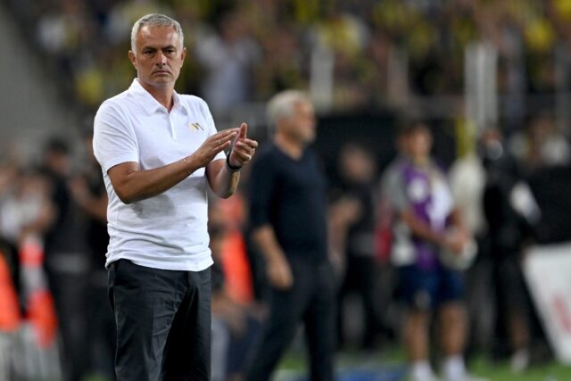 Fenerbahce coach Jose Mourinho applauds during the Champions League Qualifying Round secon