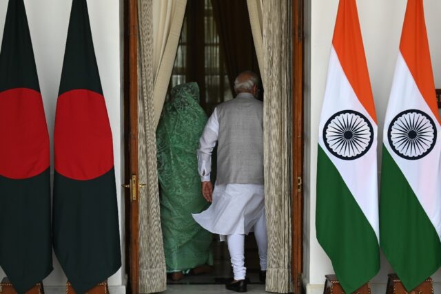 India's Prime Minister Narendra Modi (R) and now ousted Bangladeshi prime minster Sheikh H