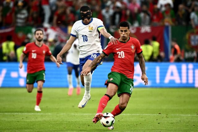 Joao Cancelo (R) made four appearances for Portugal at Euro 2024