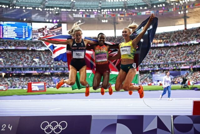 Jump for joy: 1,500m gold medallist Faith Kipyegon with bronze medallist Britain's Georgia