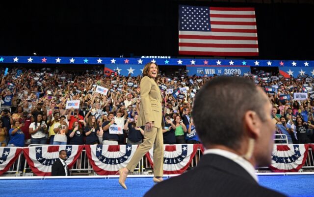Kamala Harris, shown here at a campaign rally in Arizona, has been greeted by a surge of e