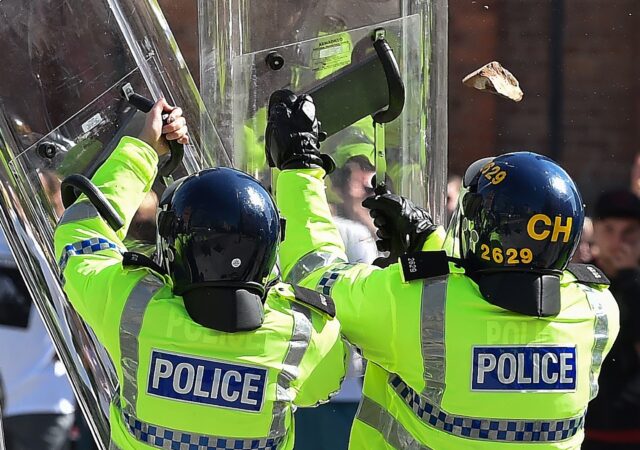 Far-right protesters threw bricks at police in the northwestern English city of Liverpool