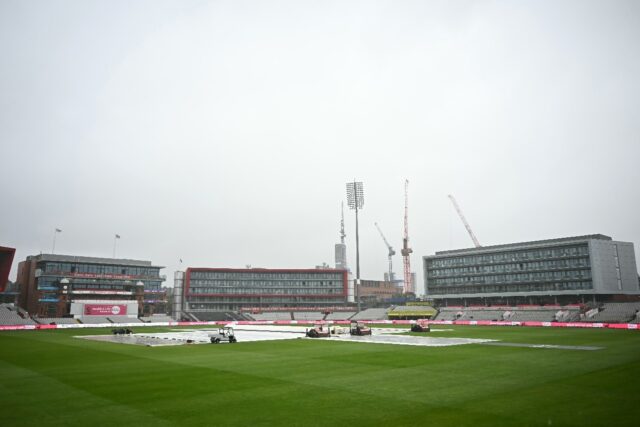 Rain pain: Covers protect the pitch prior to the second day's play in the first Test betwe