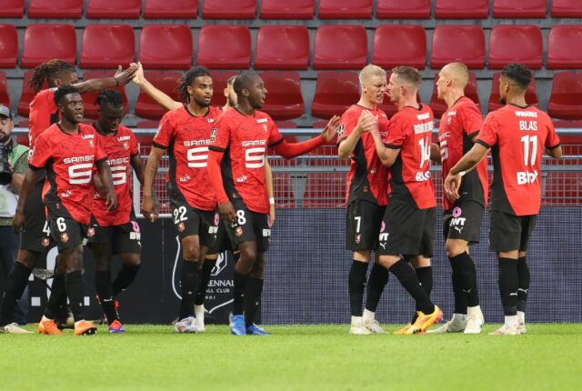 Rennes players celebrate a goal during their opening Ligue 1 win against Lyon