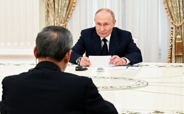 Russia's President Vladimir Putin meets China's Premier Li Qiang at the Kremlin