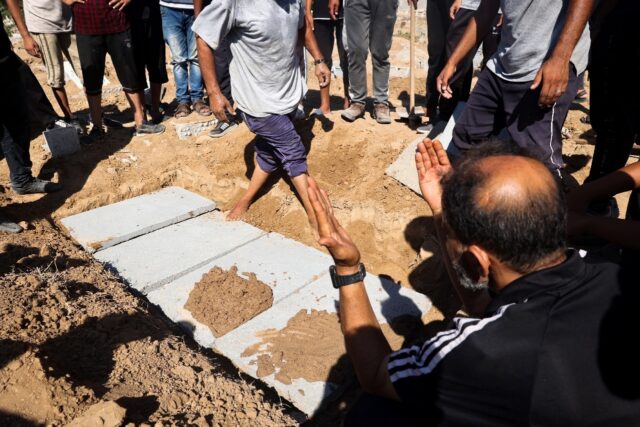 The smell of death is everywhere in war-ravaged Gaza, but people often have little time, o