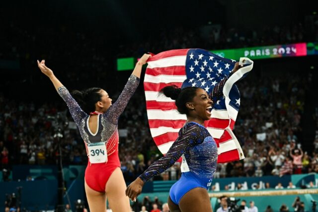 Sunisa Lee (L) lost her all-around title to US teammate Simone Biles (R) but rallied to br