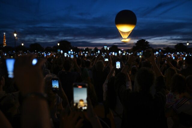 Thousands gather each night to watch the balloon rise