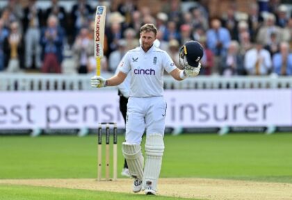 Ton-up: England's Joe Root celebrates his century in the second Test against Sri Lanka at