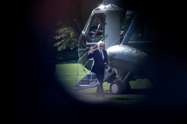 US President Joe Biden walks from Marine One to the West Wing of the White House August 12