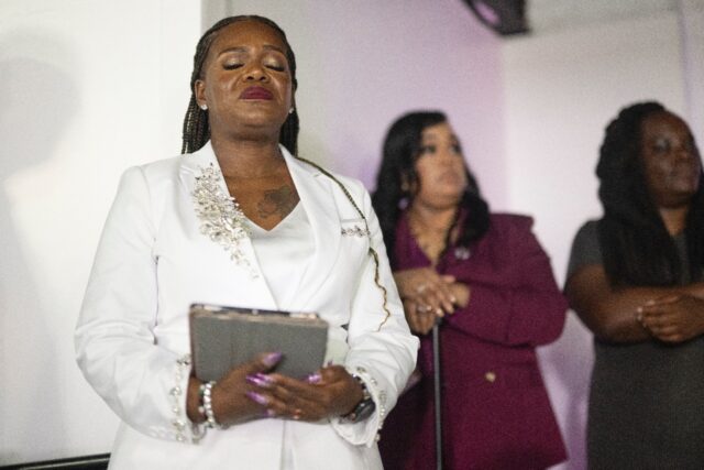 US Rep Cori Bush pauses prior to delivering her concession speech during a primary electio