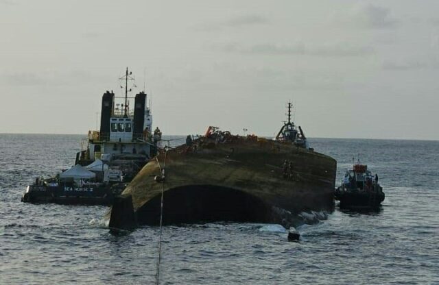 Workers refloat the Gulfstream oil tanker off the coast of Tobago on August 20, 2024