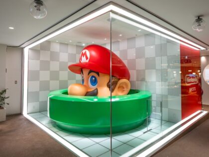 A statue of Mario entering a pipe